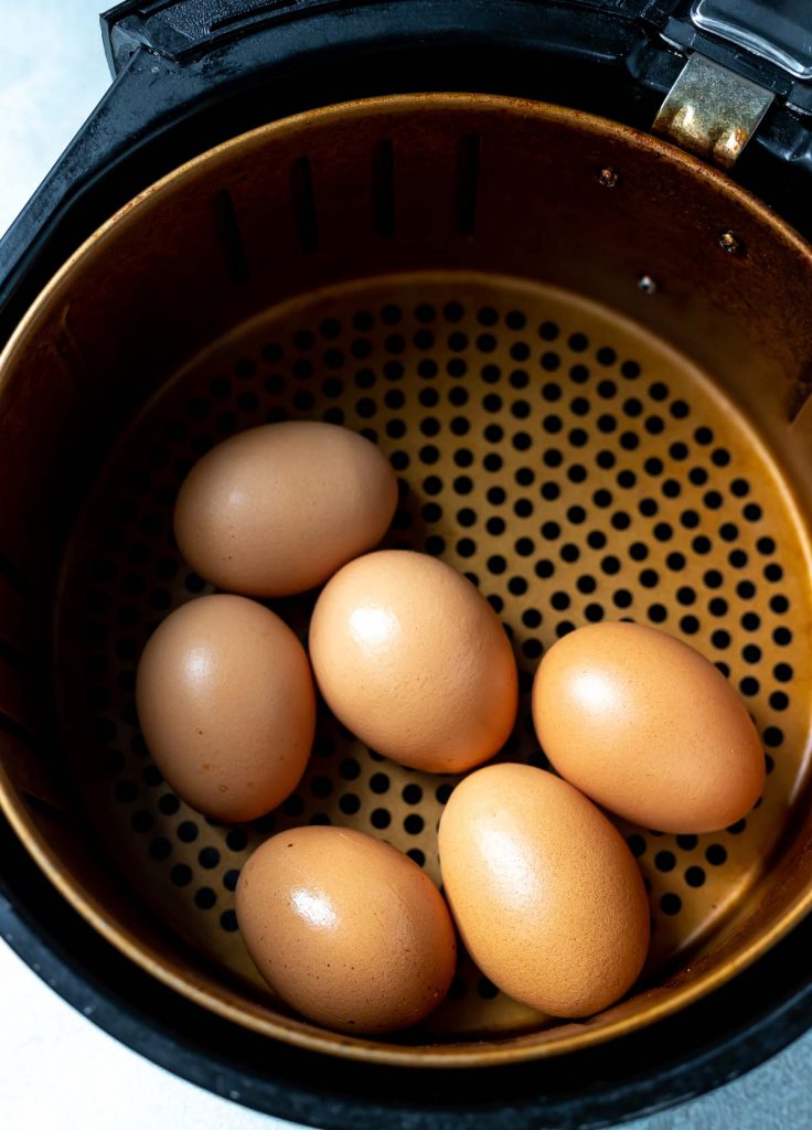 brown eggs in air fryer basket