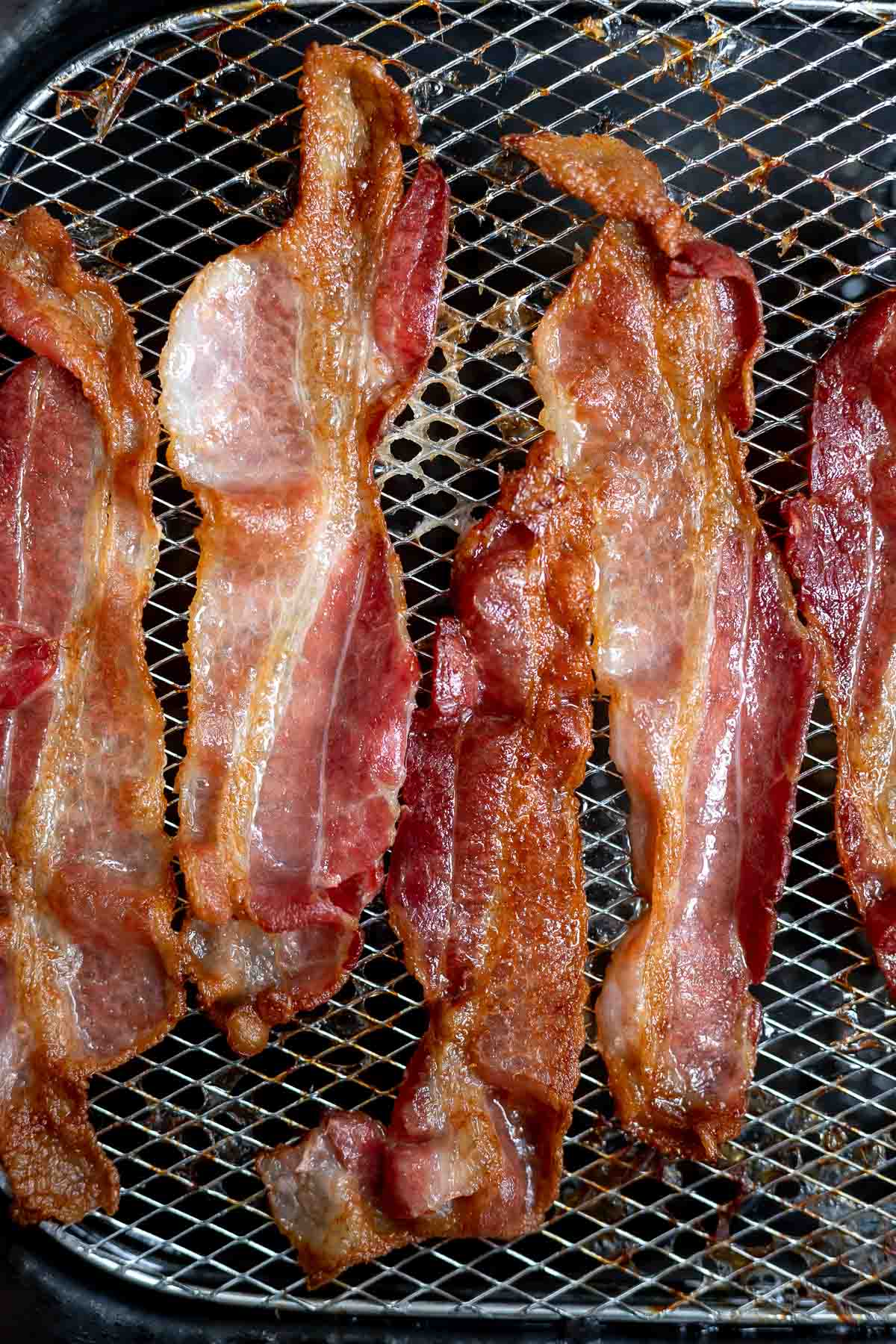 crispy air fried bacon in air fryer basket