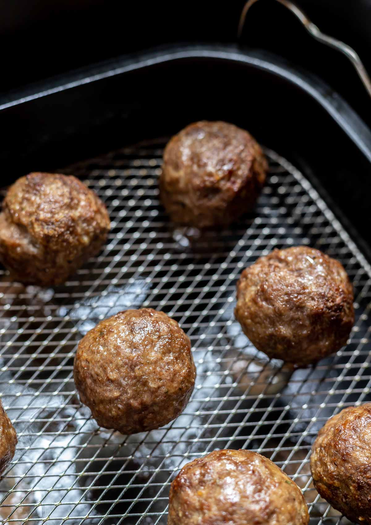 cooked meatballs in basket