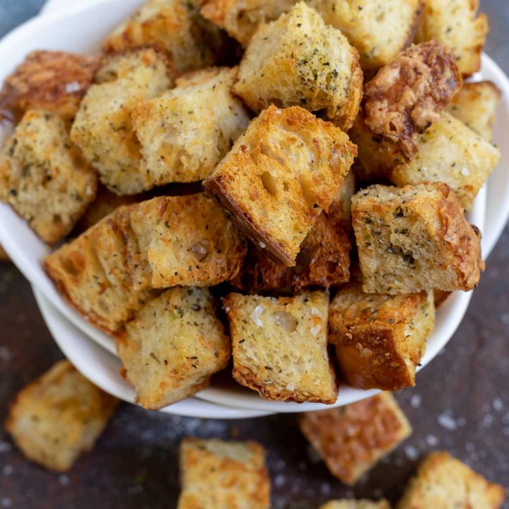 air fried croutons in white bowl