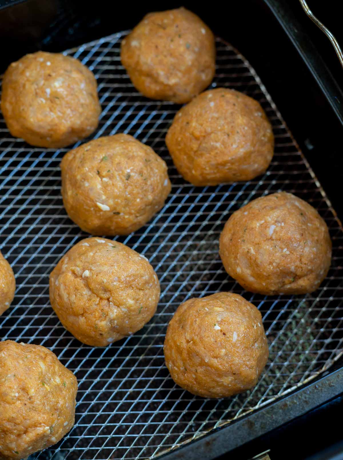 chicken meatballs in air fryer basket