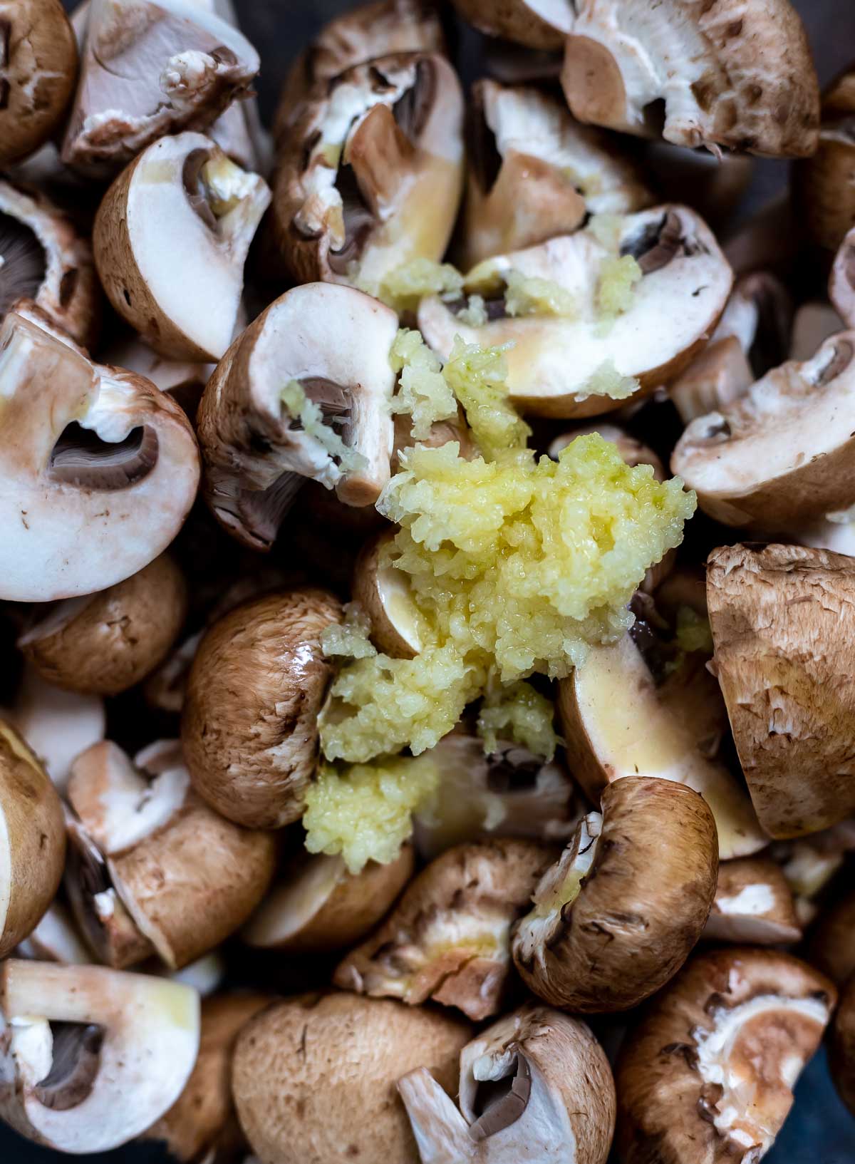 raw mushrooms and grated garlic