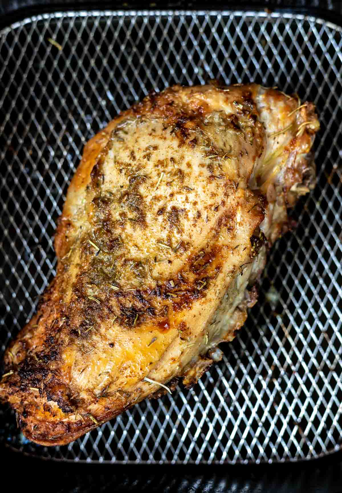 cooked turkey breast in air fryer basket