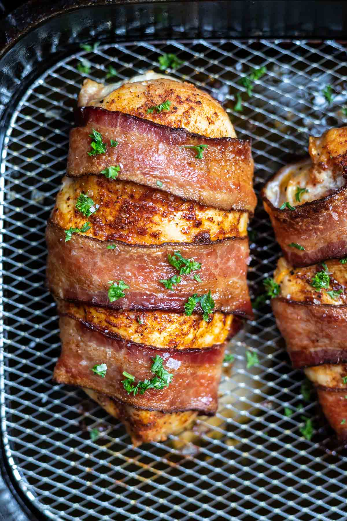 chicken wrapped Wirth bacon in air fryer basket