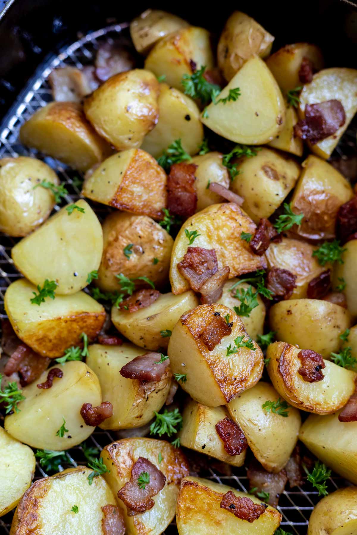 air fried potatoes and bacon in basket