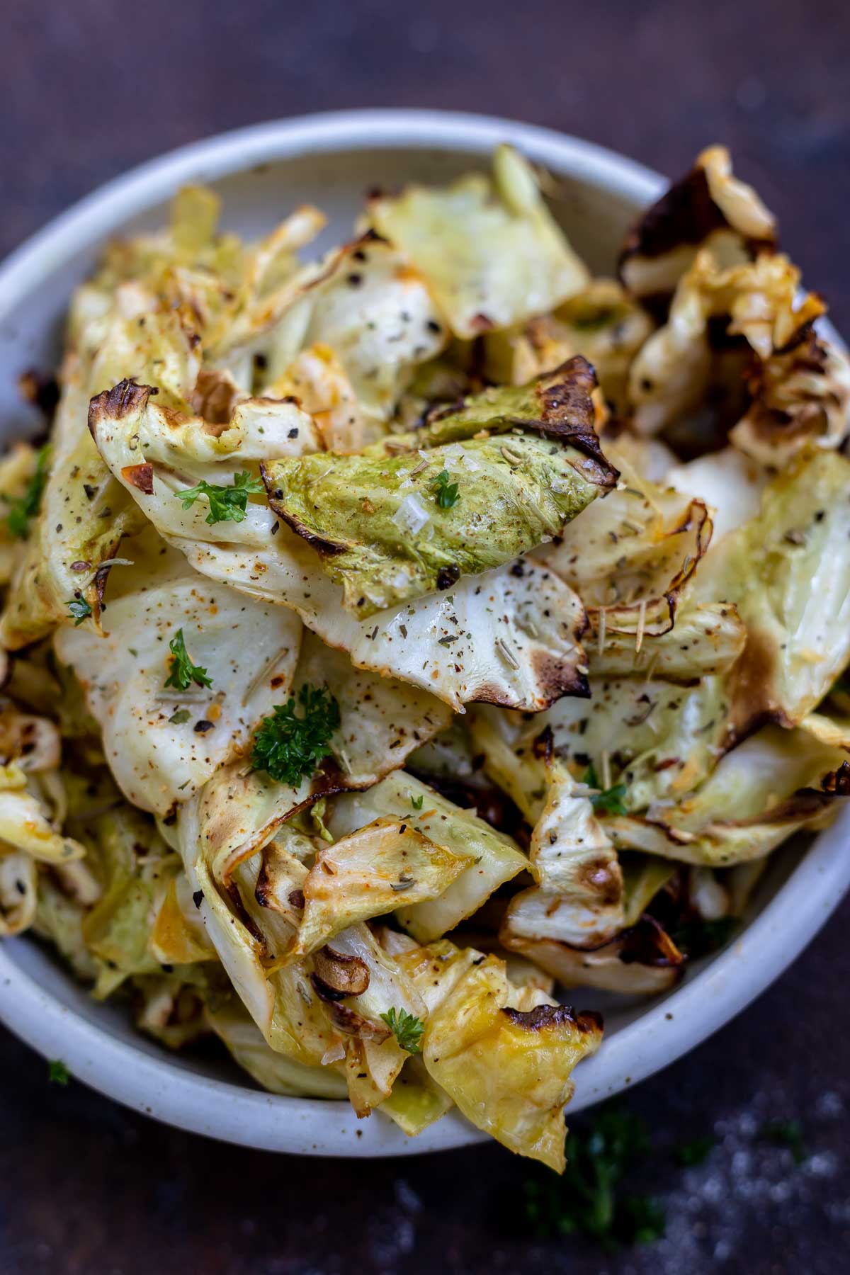 white bowl filled with air fried cabbage