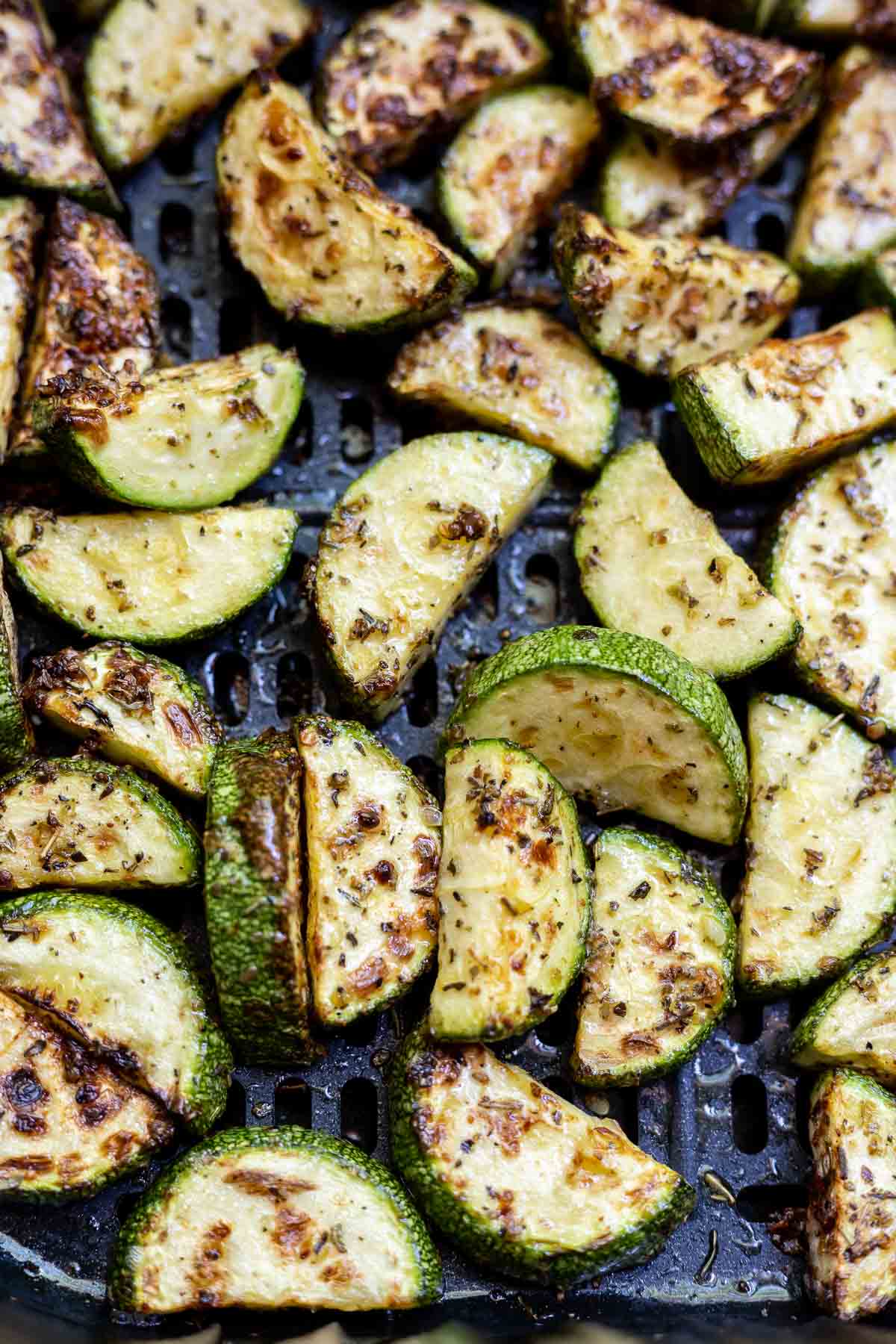 cooked zucchini in air fryer basket