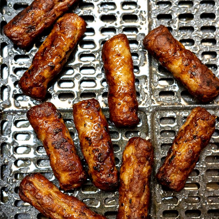 cooked sausage links in air fryer basket