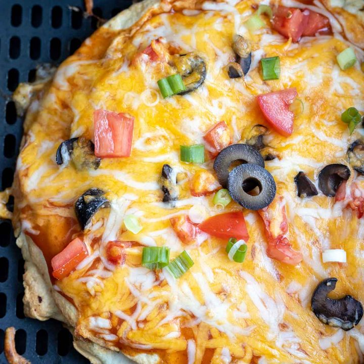 cooked Mexican pizza in air fryer basket