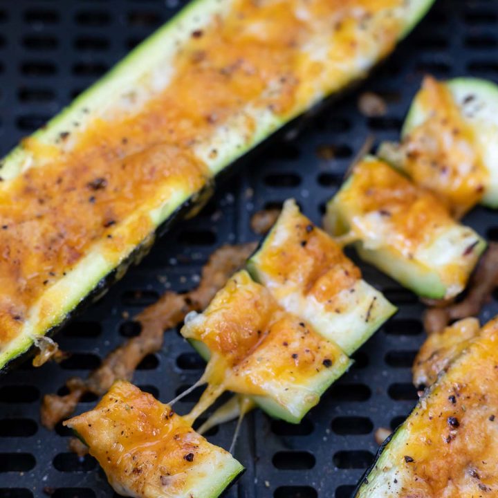 cooked cheese stuffed zucchini in air fryer basket