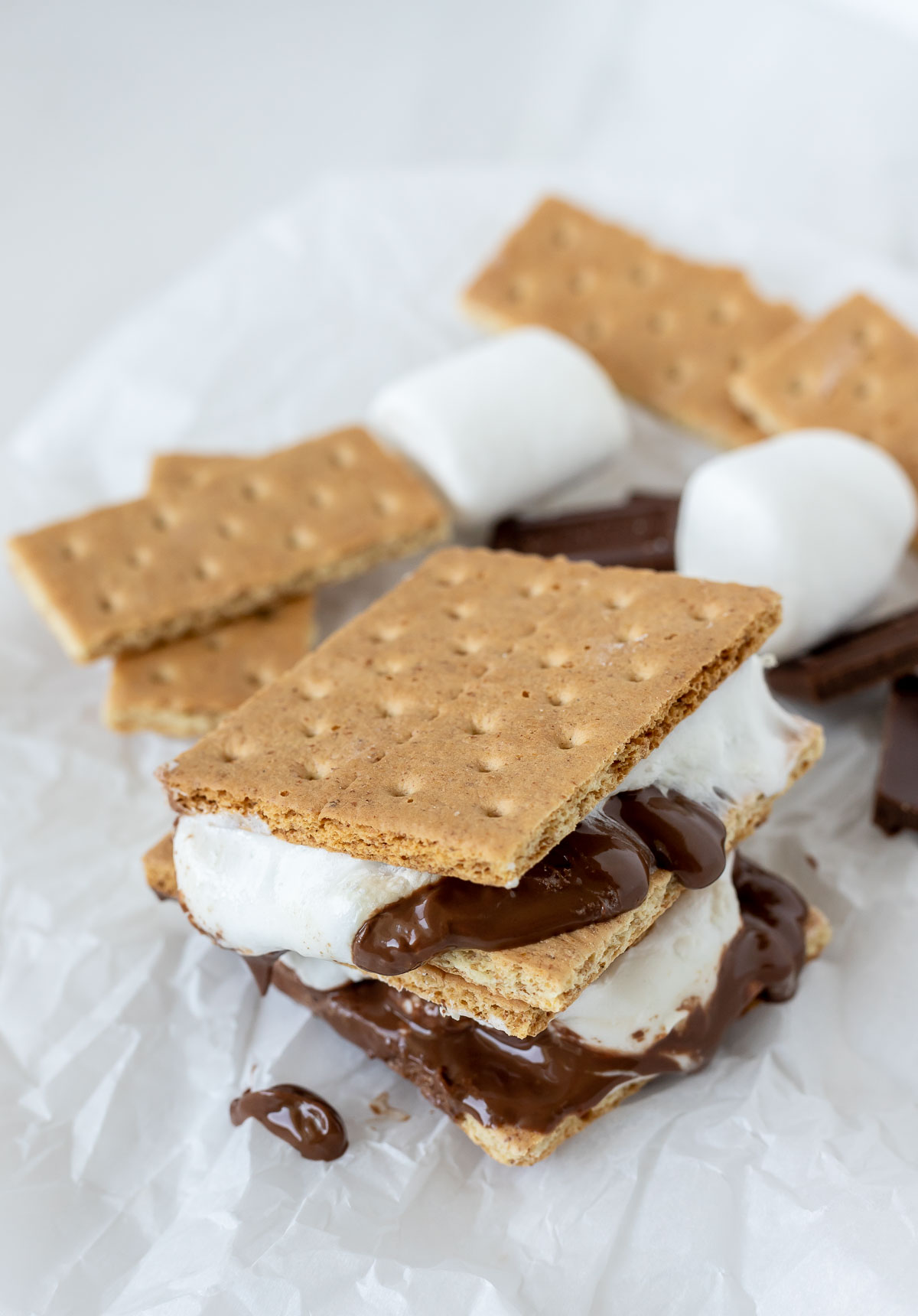 prepared melty smores on parchment paper