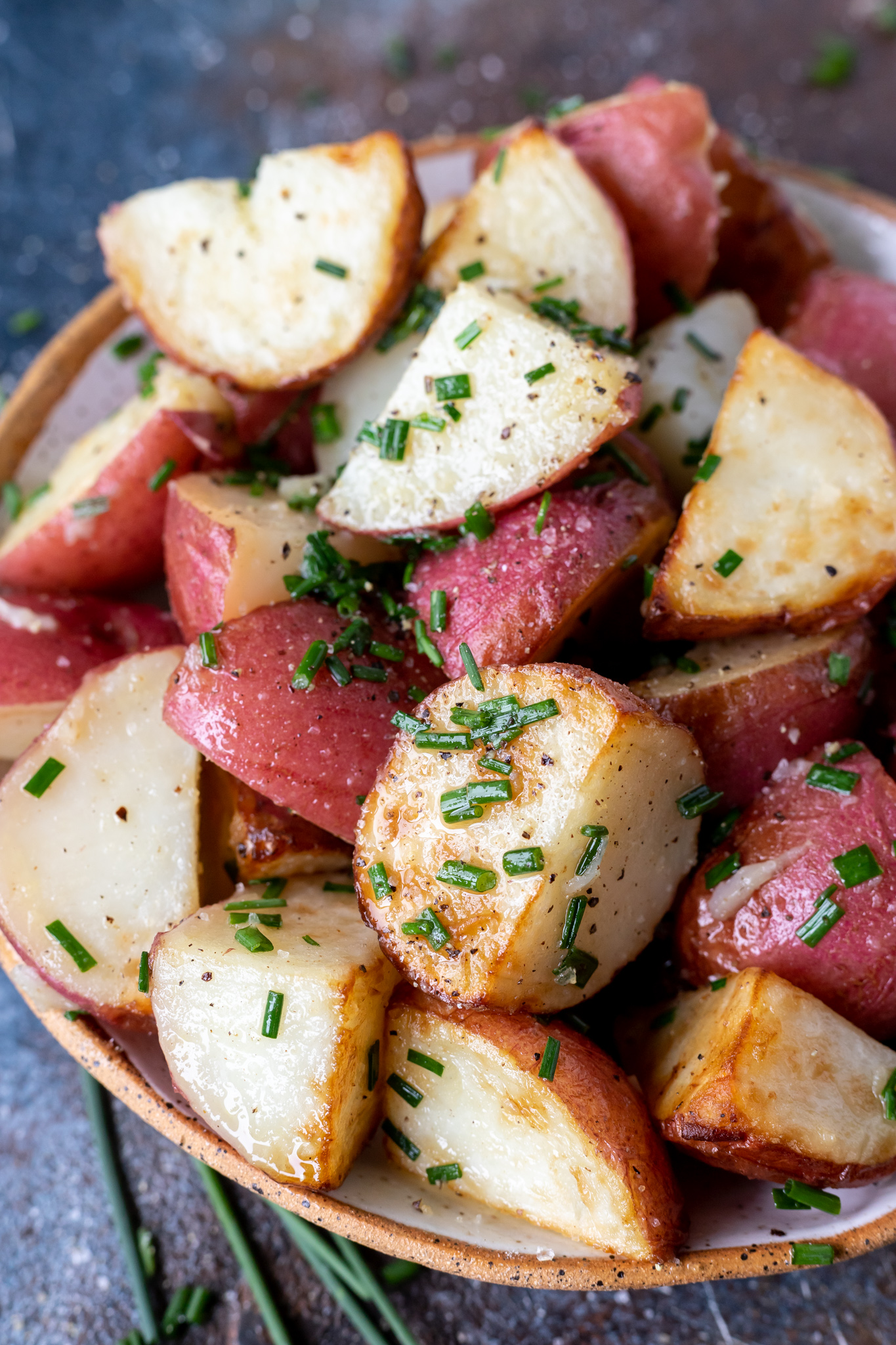 cooked butter chive potatoes served in bowl