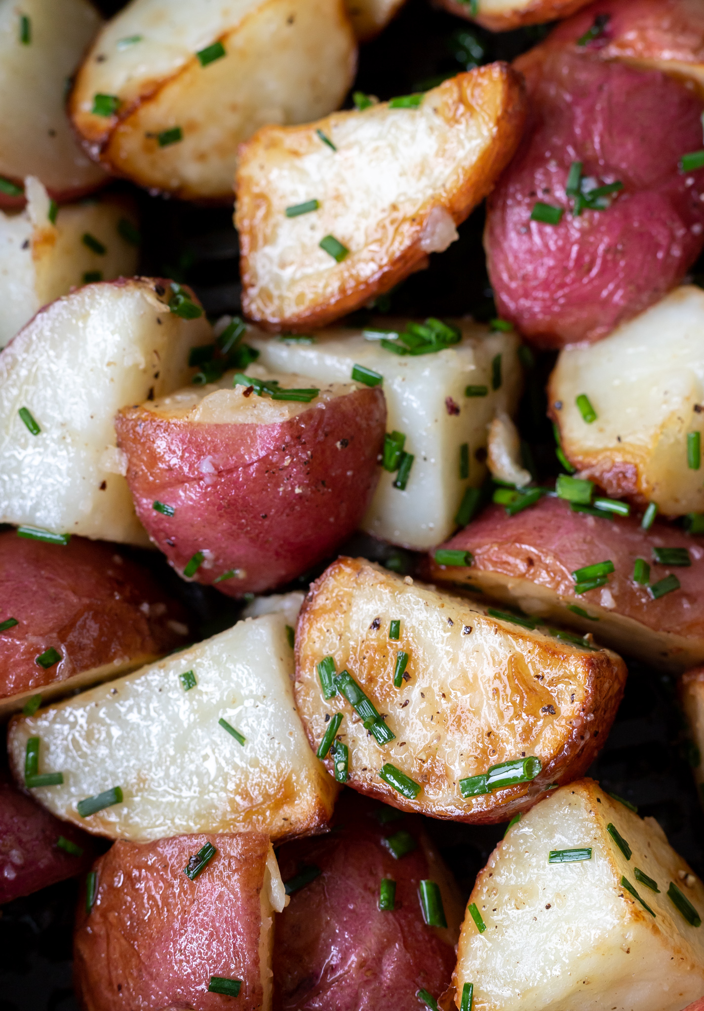cooked red potatoes tossed with butter and chopped chives