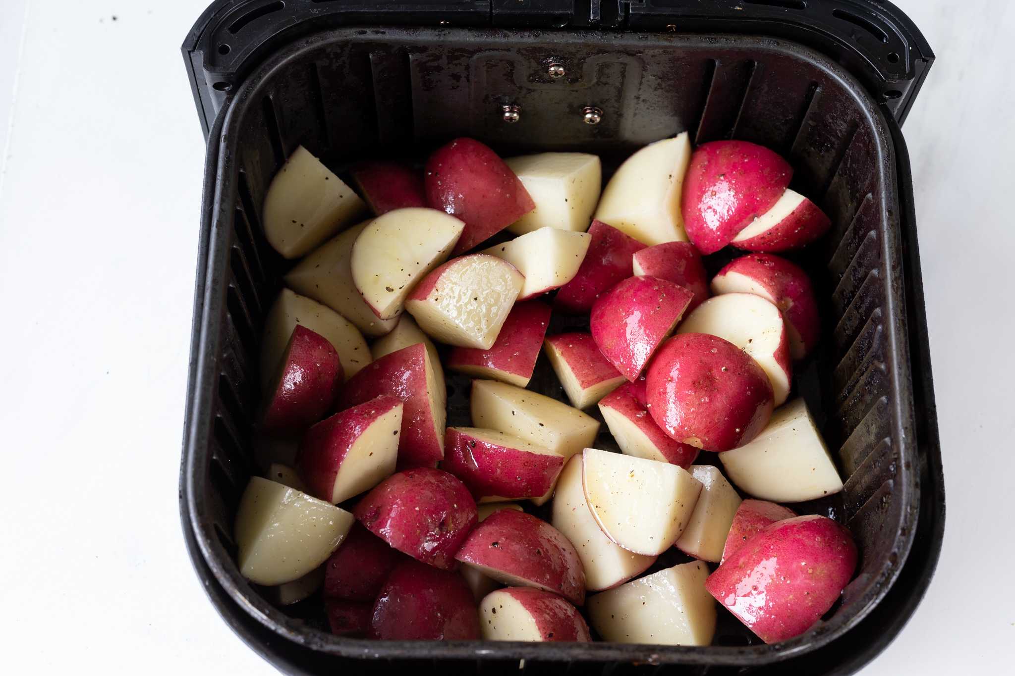 red potatoes in air fryer basket