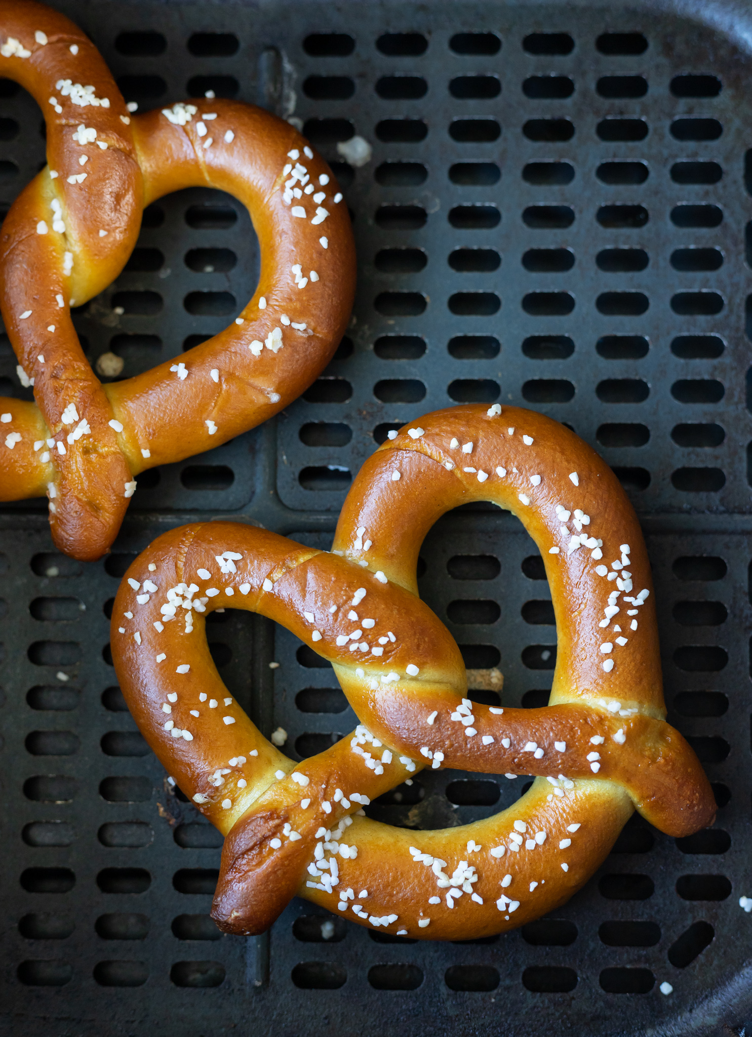 cooked golden pretzels topped with rock salt